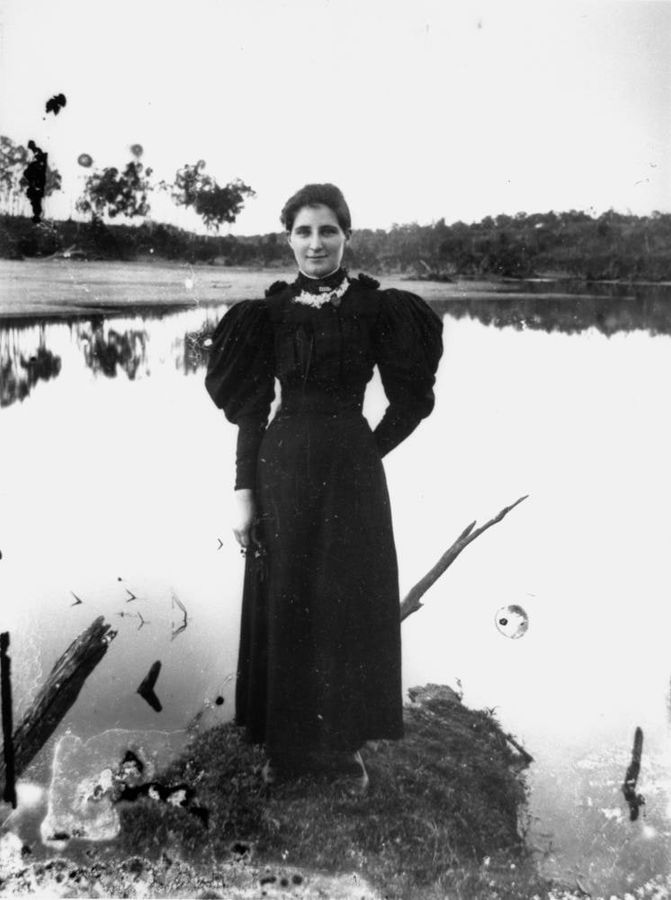 StateLibQld 2 137430 Woman standing at the water's edge, 1890-1900
