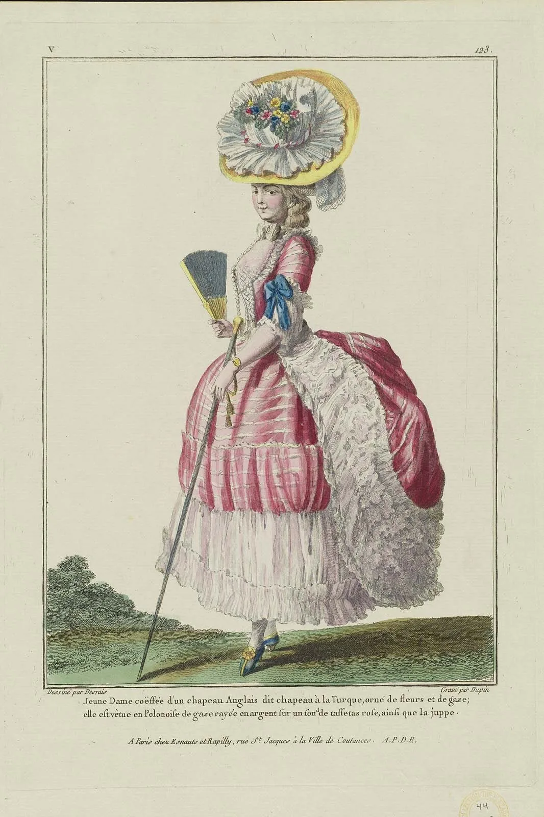 French : Jeune Dame coëffée d’un chapeau Anglais dit chapeau à la Turque, orné de fleurs et de gaze; elle est vêtue en Polonoise de gaze rayée en argent sur un fond de taffetas rose, ainsi que la juppe.