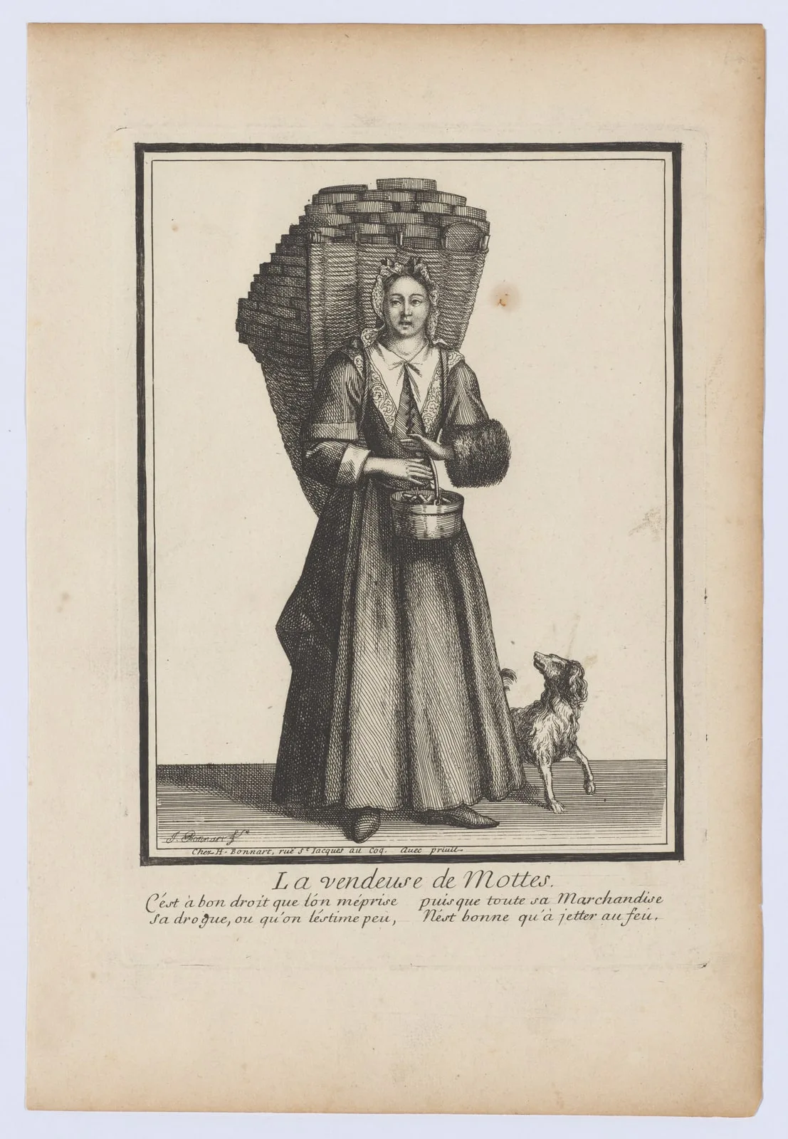 Woman selling turfs of peat